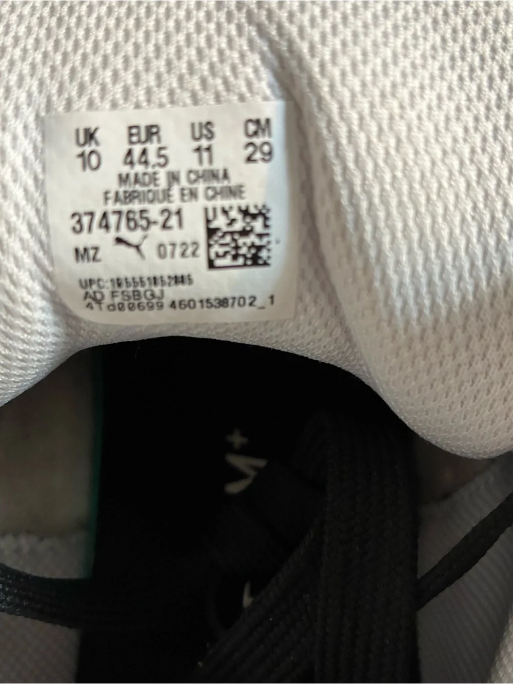 Puma White and Black High-Top Sneakers